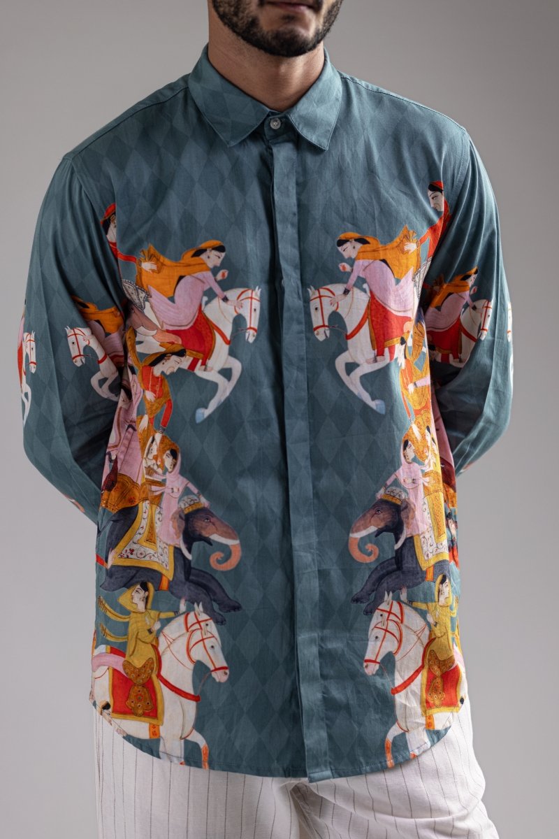 Close front view of the Kirtharjuna shirt showing the procession artwork