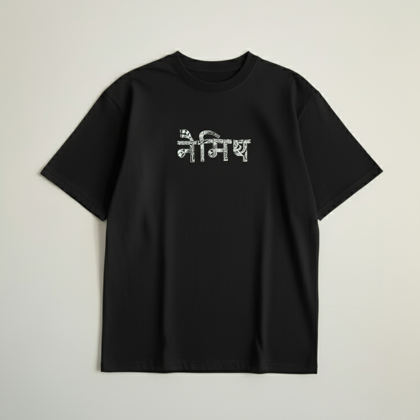 Black t-shirt with white text on a light gray background