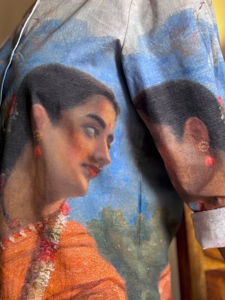 Close view of the Shakuntala artwork on the front of the shirt, showing the woman's face and sleeve